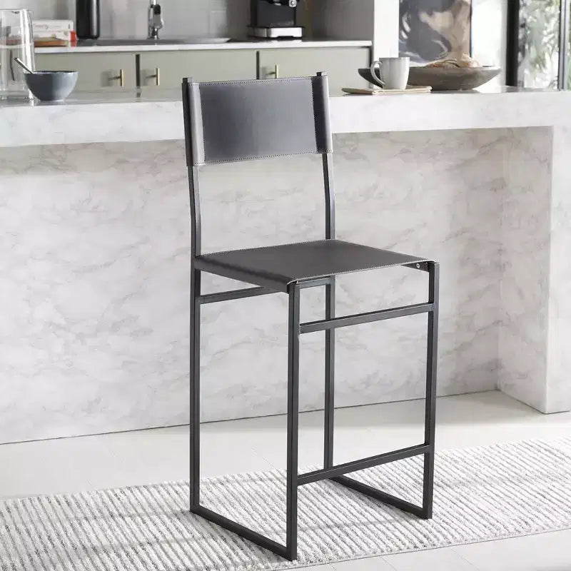 Sgabello da bancone con schienale medio e poggiapiedi, struttura in ferro, seduta in pelle, altezza 26"