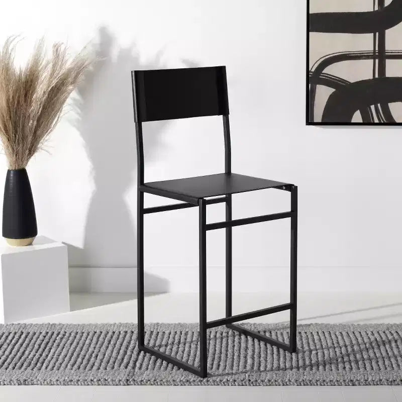 Sgabello da bancone con schienale medio e poggiapiedi, struttura in ferro, seduta in pelle, altezza 26"